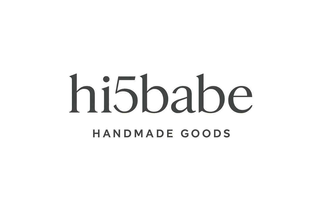 make it a classy modern logo that says hi5babe, handmade goods is in smaller font