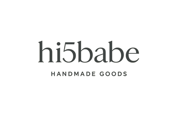 make it a classy modern logo that says hi5babe, handmade goods is in smaller font